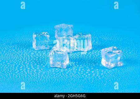 Five ice cubes for drinks with water drops Stock Photo