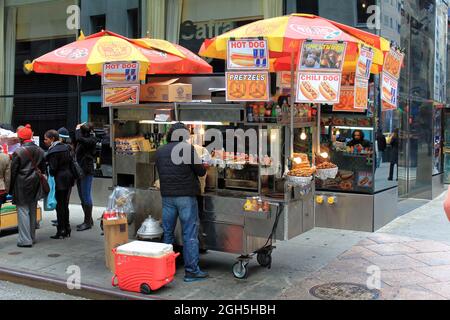 New York, USA - November 20: Food vending carts on the street in Manhattan. These mobile food carts require permits Stock Photo