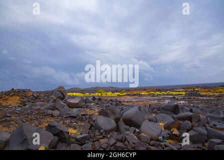 Dessert and clouds, Dessert Mountains, with Rocks and Dessert Road, Saudi Arabian Dessert Stock Photo