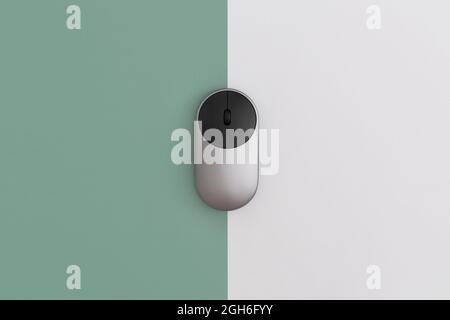 Wireless computer mouse on color background, technology concept Stock Photo