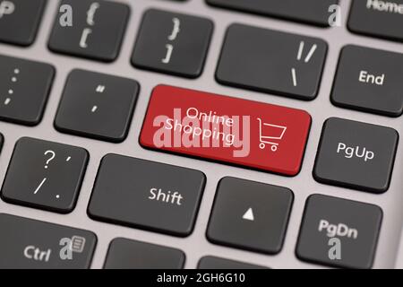 Button with the word online shopping on a keyboard. Stock Photo