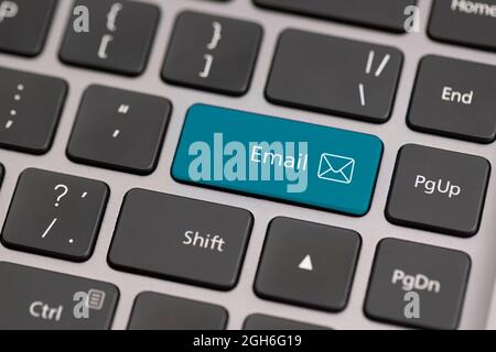 Button with the word email on a keyboard. Communication on internet globally concept. Stock Photo
