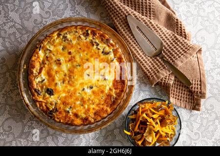Salty pie or quiche made with Craterellus lutescens or Cantharellus lutescens or Cantharellus xanthopus or Cantharellus aurora, commonly known as Yell Stock Photo