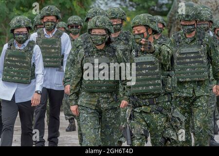 Taichung, Taiwan. 16 July, 2020. Taiwan President Tsai Ing Wen, center, in full combat uniform tours the Han Kuang - Chinese Glory live fire military exercise July 16, 2020 in Taichung, Taiwan. Credit: Makoto Lin/ROC President Press Office Stock Photo