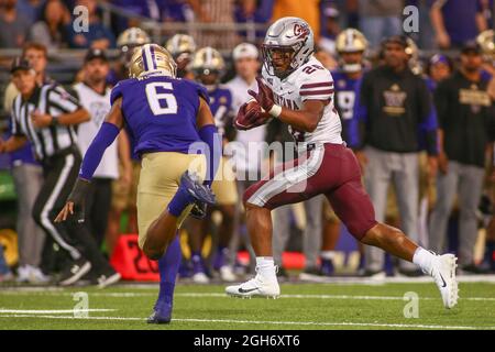 Seattle, WA, USA. 4th Sep, 2021. Montana Grizzlies running back Isiah Childs (28) runs the ball during a game between the Montana Grizzlies and Washington Huskies at Husky Stadium in Seattle, WA. The Grizzlies defeated the Huskies 13-7. Sean Brown/CSM/Alamy Live News Stock Photo