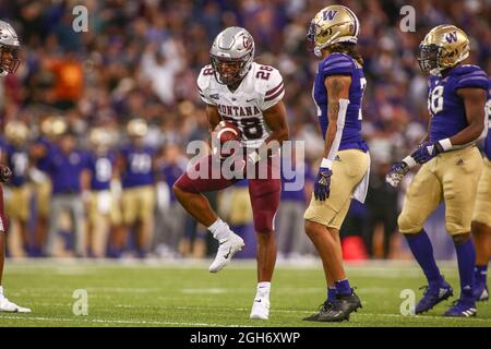 Seattle, WA, USA. 4th Sep, 2021. Montana Grizzlies running back Isiah Childs (28) celebrates a run for a first down during a game between the Montana Grizzlies and Washington Huskies at Husky Stadium in Seattle, WA. The Grizzlies defeated the Huskies 13-7. Sean Brown/CSM/Alamy Live News Stock Photo