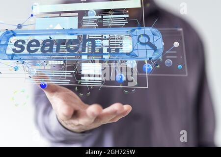A digital 3d Interface web application floating in hand Stock Photo