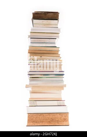 Pile of old and new books isolated on white background Stock Photo