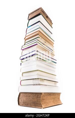 Pile of old and new books isolated on white background Stock Photo