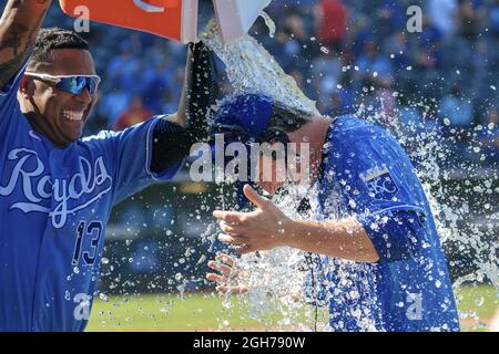 Kansas City, United States. 05th Sep, 2021. Kansas City Royals catcher Salvador Perez (13) douses Royals starting pitcher Brady Singer (51) with water after defeating the Chicago White Sox at Kauffman Stadium in Kansas City, Missouri on Sunday, September 05, 2021. Photo by Kyle Rivas/UPI Credit: UPI/Alamy Live News Stock Photo