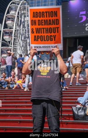 New York, New York, USA. 4th Sep, 2021. 30 or so protesters in Times Square protesting the anti abortion law in Texas asking for abortion on demand and upholding the rights of women. Texas Gov. Greg Abbott signed Texas Law 8 restricting abortions to 6 weeks. (Credit Image: © Milo Hess/ZUMA Press Wire) Stock Photo