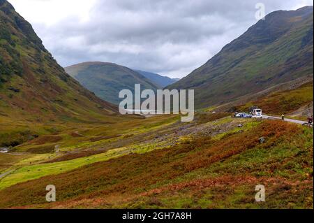 road through mountain pass in Scottish Highlands Stock Photo