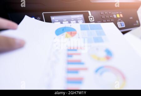 Copy, print, scan, and fax machine in office. Document and paper work. Office worker print paper on multifunction laser printer. Modern print Stock Photo