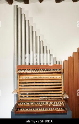 Old wooden organ, First diocesan built museum in Spain, Museo Diocesano Regina Coeli, Santillana del Mar, Cantabria, Spain Stock Photo