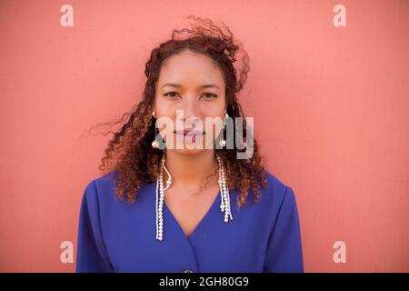 Young woman with serious expression shot up close Stock Photo