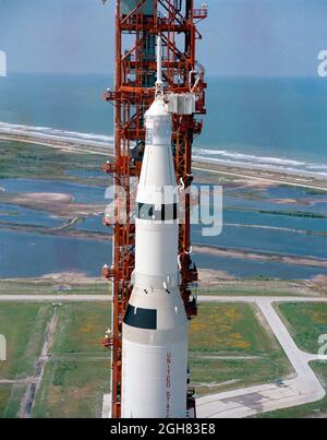 (4 May 1969) --- Aerial (high-angle, clasp) view of the Apollo 10 (Spacecraft 106/Lunar Module 4/Saturn 505) space vehicle on Pad B, Launch Complex 39, Kennedy Space Center. This photograph of the 363-feet tall Apollo/Saturn V stack was taken during pull back of the mobile service structure. The Apollo 10 crew will be astronauts Thomas P. Stafford, John W. Young, and Eugene A. Cernan. Stock Photo