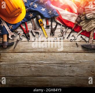 Labor Day - National Holiday - Mechanic Tools And Usa Flag On Wooden Background Stock Photo