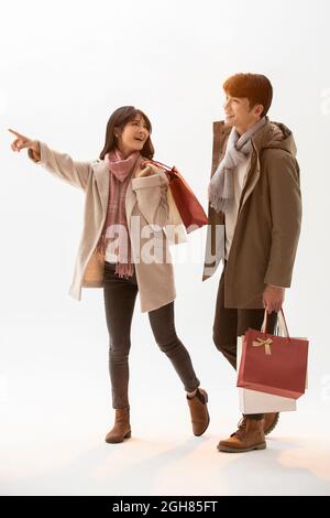 Happy young couple shopping Stock Photo