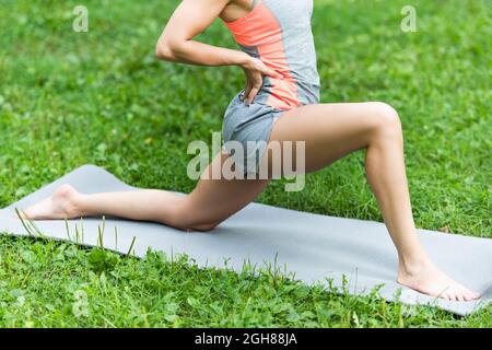 Side View Attractive Young Female Sitting Barefoot Yoga Mat Stretching  Stock Photo by ©Halyna.bobyk11@gmail.com 652221176
