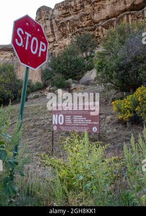 A welcome sign on the Jicarilla Apache Reservation in Dulce, New Mexico, lists rules like no hunting, no trespassing and no fishing. Stock Photo