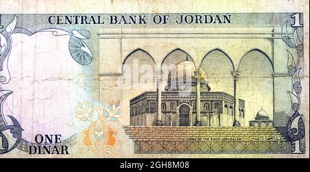 Large fragment of the reverse side of 1 one Jordanian dinar banknote currency from date 1975 to 1992 issued with dome of the rock, Jerusalem, Al Aqsa Stock Photo