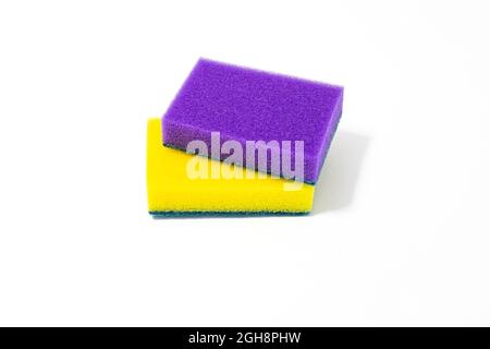 synthetic sponges for cleaning the house and washing dishes on a white background Stock Photo