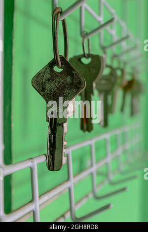 Locks lined up hanging on the wall Stock Photo