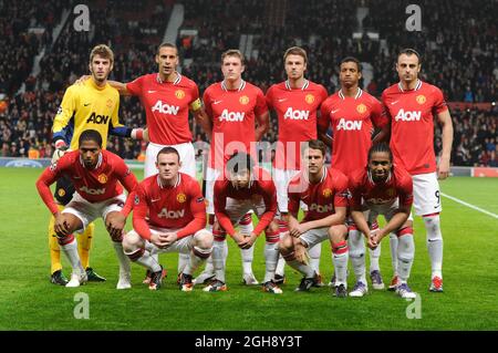 Manchester United team group back row: David De Gea, Rio Ferdinand, Phil Jones, Jonny Evans, Nani, and Dimitar Berbatov of Manchester United.Front row: Luis Antonio Valencia, Wayne Rooney, Fabio Da Silva, Michael Owen and Anderson of Manchester United pose for a photograph during the UEFA Champions League Group C match between Manchester United and CS Otelul Galati on 2nd November, 2011. Stock Photo