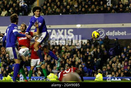 Marouane Fellaini of Everton headers at goal during the Barclays Premier League between Everton and Swansea City at the Goodison Park in Liverpool, England on January 12, 2013. Paul Thomas Stock Photo