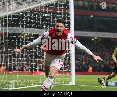 Arsenal's Olivier Giroud celebrates scoring his sides fifth goal during the Barclays Premier League between Arsenal and West Ham United at the Emirates Stadium in London on January 23, 2013. Stock Photo