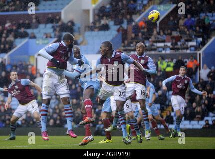 Carlton Cole of West Ham almost snatches a late equaliser with this header, tipped over by Villa goalkeeper Brad Guzan during the Barclays Premier League between Aston Villa and West Ham United at the Villa Park in Birmingham on February 08th, 2013. Stock Photo