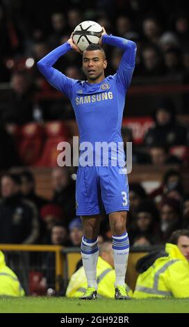 Ashley Cole of Chelsea takes a throw in during the FA Cup quarter-final match between Manchester United and Chelsea at the Old Trafford Stadium in Manchester, United Kingdom on March 10, 2013. Stock Photo