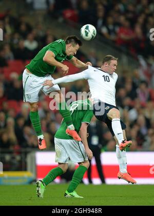 Sean St Ledger of Ireland gets above Wayne Rooney of England during the International Friendly match between England and the Republic of Ireland at Wembley Stadium in London, UK on May 29, 2013. Picture Simon Bellis Stock Photo