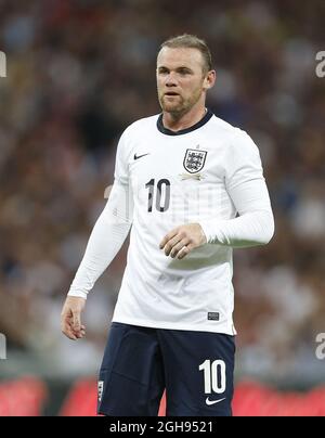England's Wayne Rooney during the Vauxhall International Friendly match between England and Scotland held at the Wembley Stadium in London, UK on Aug. 14, 2013. Stock Photo