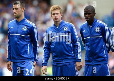 Kevin De Bruyne of Chelsea with Gary Cahill of Chelsea and Nascimento Ramires of Chelsea during the Barclays Premier League match between Chelsea and Hull City Tigers at Stamford Bridge in London on Aug. 18, 2013. Stock Photo