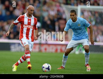 Stephen Ireland of Stoke City plays the ball on his debut for the club during the Barclays Premier League match between Stoke City and Manchester City held at the Britannia stadium in Stoke on Trent, UK on September 14th 2013. Photograph Simon Bellis. Stock Photo
