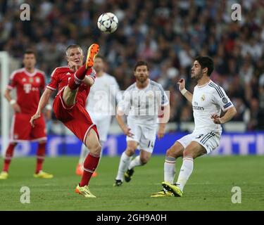 Munich's Bastian Schweinsteiger in action during their UEFA Champion League semi-final first leg soccer match between Real Madrid and Bayern Munich at Santiago Bernabeu in Madrid, Spain on April 23, 2014. Pic David Klein Stock Photo