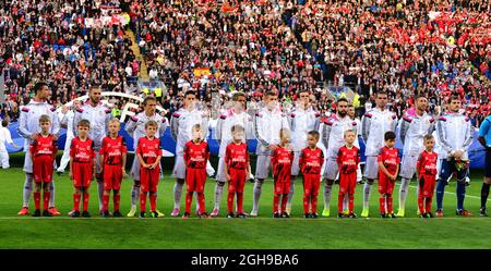 The Galacticos of Real Madrid line up before the match - UEFA Super Cup match between Real Madrid and Sevilla at Cardiff City Stadium in Cardiff, Britain on Aug. 12, 2014. Pic Simon Bellis/Sportimage. Stock Photo