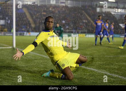 Didier Drogba of Chelsea celebrates his goal during the Capital One Cup Fourth Round match between Shrewsbury Town and Chelsea at the Greenhous Meadow Stadium, London on 28, October 2014. Stock Photo