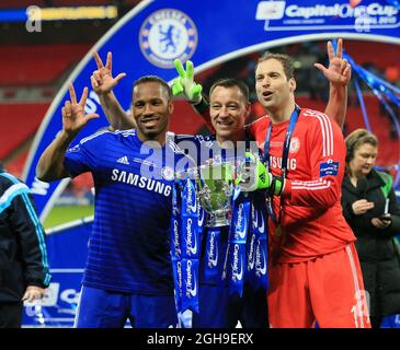 Chelsea's Didier Drogba, John Terry and Petr Cech celebrate with the trophy during the Capital One Cup final match between Chelsea and Tottenham Hotspur at Wembley Stadium, England on March 1, 2015. Picture David Klein. Stock Photo