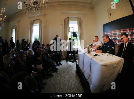 England's Wayne Rooney and Roy Hodgson during a press conference at the Grove Hotel.  Photo credit should read: David Klein/Sportimage via PA Images Stock Photo