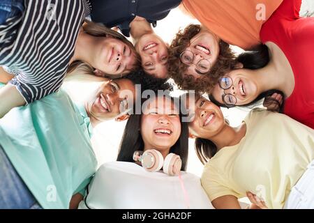 Multiracial group of friends taking a selfie - New concept of normal friendship with young people looking at the camera and laughing. Stock Photo