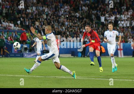 Wayne Rooney of England gets in a shot on goal during the UEFA European Championship 2016 match at the Stade Geoffroy-Guichard, St Etienne. Picture date June 20th, 2016 Pic David Klein/Sportimage via PA Images Stock Photo