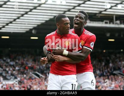Manchester United's Paul Pogba celebrates with goalscorer Anthony Martial during the premier league match at Old Trafford Stadium, Manchester. Picture date 13th August 2017. Picture credit should read: David Klein/Sportimage via PA Images Stock Photo