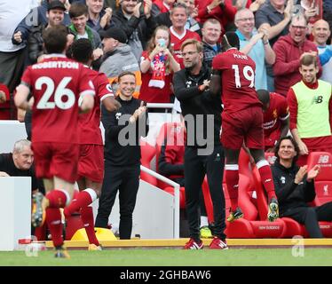 Liverpool's Sadio Mane celebrates scoring his sides opening goal with Jurgen Klopp during the premier league match at the Anfield Stadium, Liverpool. Picture date 19th August 2017. Picture credit should read: David Klein/Sportimage via PA Images Stock Photo