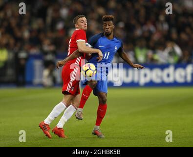 France's Kingsley Coman tussles with Wales' Andy King during the International friendly match at the Stade de France, Paris . Picture date: 10th November 2017. Picture credit should read: David Klein/Sportimage via PA Images Stock Photo