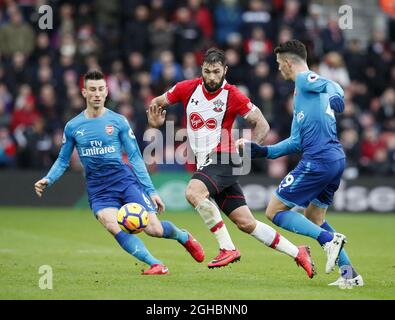 Southampton's Charlie Austin tussles with Laurent Koscielny of Arsenal during the premier league match at St Mary's Stadium, Southampton. Picture date 10th December 2017. Picture credit should read: David Klein/Sportimage via PA Images Stock Photo