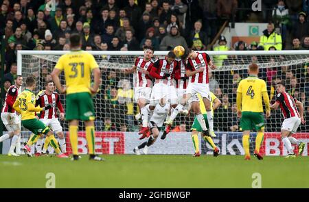 Norwich City's James Maddison (second left) is denied by Sheffield United's (L-R) Ryan Leonard, Leon Clarke, Jack O'Connell and Chris Basham   Stock Photo