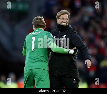 Jurgen Klopp manager of Liverpool enjoys the win with Loris Karius of Liverpool during the premier league match at the Anfield Stadium, Liverpool. Picture date 24th February 2018. Picture credit should read: Simon Bellis/Sportimage via PA Images Stock Photo