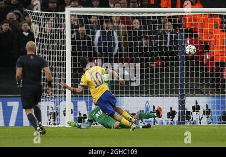 Juventus' Paulo Dybala scoring his sides second goal during the Champions League Round of 16 match at Wembley Stadium, London. Picture date: March 7th 2018. Picture credit should read: David Klein/Sportimage via PA Images Stock Photo